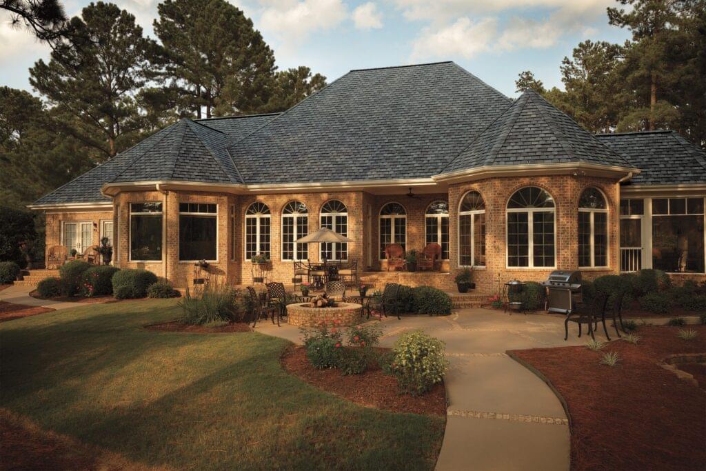 Photo displaying a home using GAF's Camelot Aged Oak Shingles