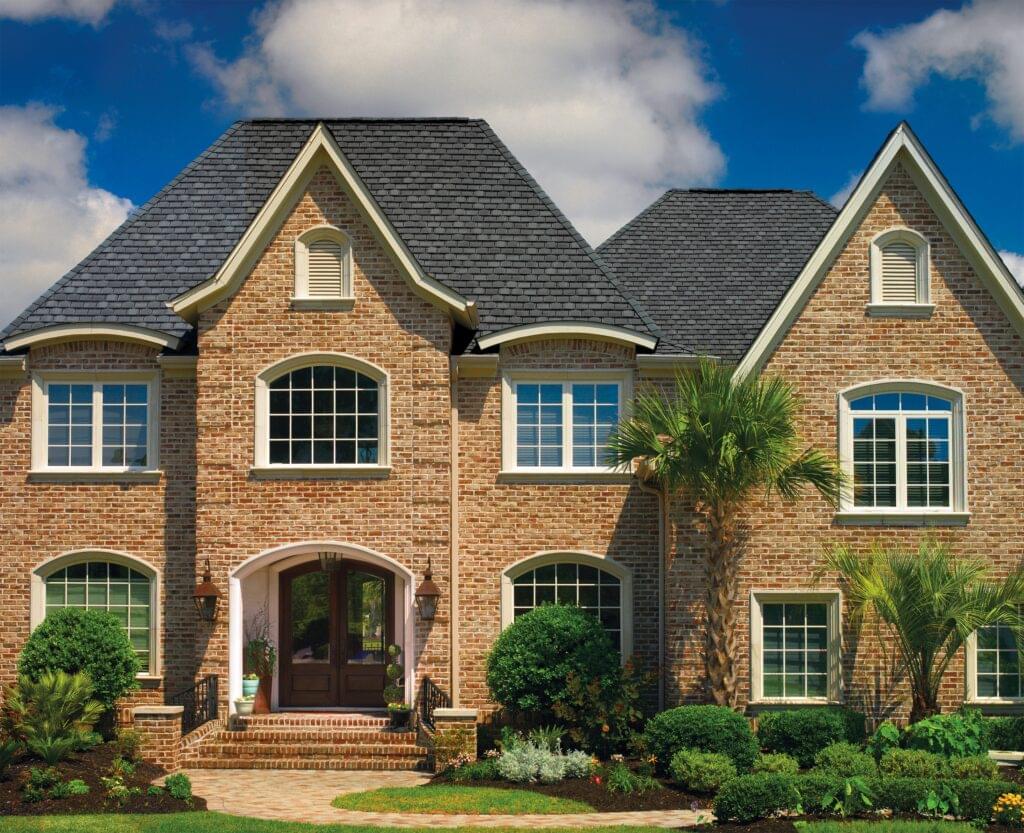 Photo displaying a home using GAF's Camelot Welsh Grey shingles